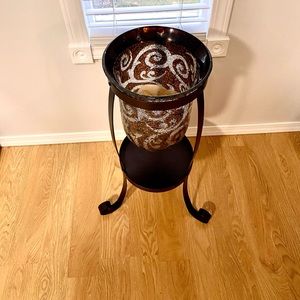 Used like new Partylite candle holder.Holds the Big Daddy candle. Flower case?